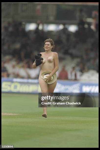 Streaker interupts play during the first test between England and Pakistan at Lords cricket ground, London. Mandatory Credit: Graham...