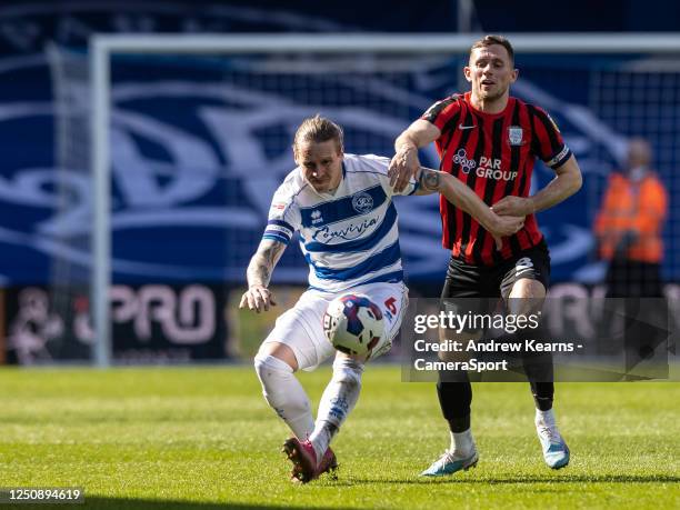 Preston North End's Alan Browne competing with Queens Park Rangers' Stefan Johansen during the Sky Bet Championship between Queens Park Rangers and...