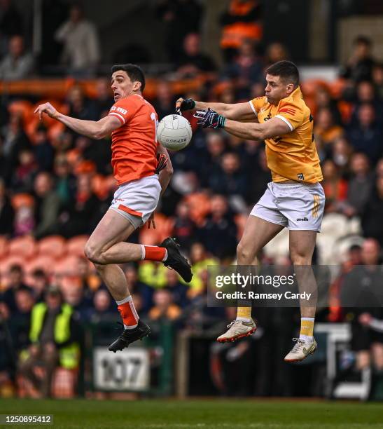 Armagh , United Kingdom - 8 April 2023; Patrick McBride of Antrim in action against Rory Grugan of Armagh during the Ulster GAA Football Senior...