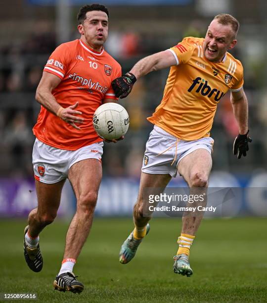 Armagh , United Kingdom - 8 April 2023; Stefan Campbell of Armagh in action against Marc Jordan of Antrim during the Ulster GAA Football Senior...