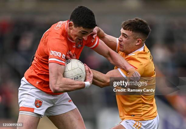 Armagh , United Kingdom - 8 April 2023; Rory Grugan of Armagh in action against Eoghan McCabe of Antrim during the Ulster GAA Football Senior...