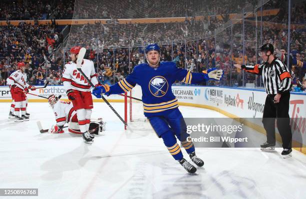 Buffalo Sabres center Casey Mittelstadt celebrates his first period goal against Carolina Hurricanes goaltender Antti Raanta during an NHL game on...