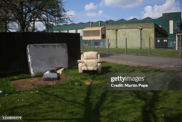 Mattress and a sitting room chair lay abandoned in the residents area at the RAF base, overlooked by RAF buildings on April 08, 2023 in Scampton,...