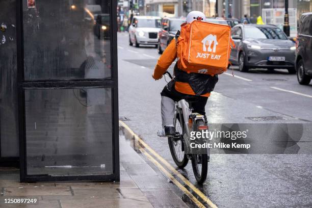 Just Eat takeaway delivery cycle courier on 9th March 2023 in London, United Kingdom. Just Eat Limited is a British online food order and delivery...