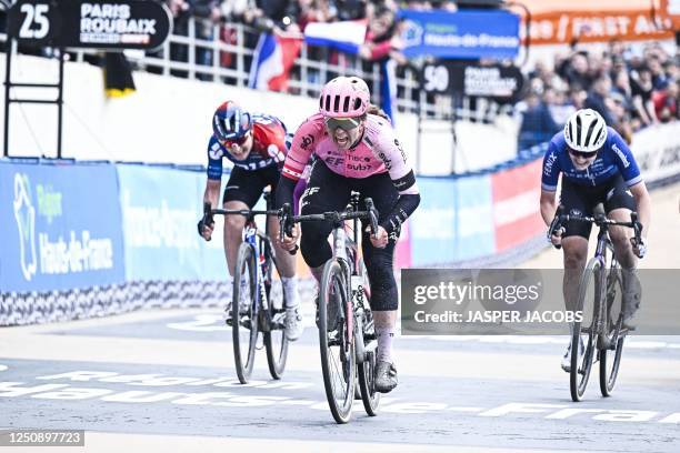 Canadian Alison Jackson of EF Education-TIBCO-SVB wins the third edition of the women elite race of the 'Paris-Roubaix' cycling event 4 km from...