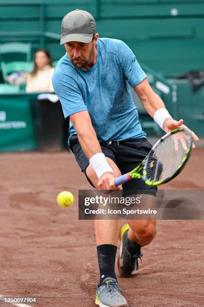 Steve Johnson returns a shot during Round 2 play at the US Clay Court Championship at River Oaks Country Club on April 8 in Houston, Texas.