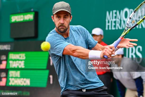 Steve Johnson returns a shot during Round 2 play at the US Clay Court Championship at River Oaks Country Club on April 8 in Houston, Texas.