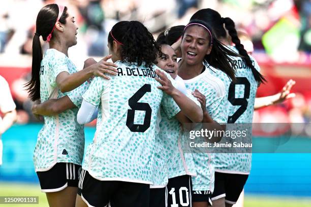 Charlyn Corral of the Mexican National Team celebrates after scoring on a penalty kick in the first half against the Chicago Red Stars at SeatGeek...