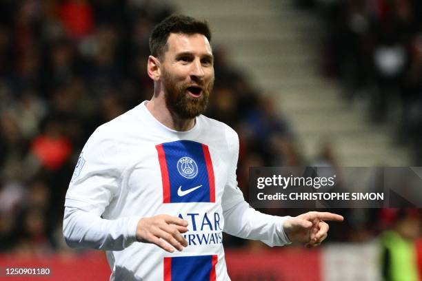 Paris Saint-Germain's Argentine forward Lionel Messi celebrates after scoring a goal during the French L1 football match between Nice and Paris...