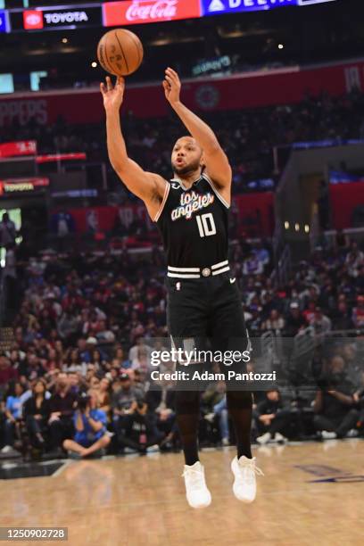 Eric Gordon of the LA Clippers shoots a three point basket during the game on April 8, 2023 at Crypto.Com Arena in Los Angeles, California. NOTE TO...