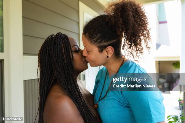 loving lesbian couple kiss - black lesbians kiss stock pictures, royalty-free photos & images