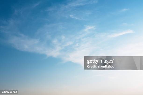 cloudy sky at sunset - cirrus stock pictures, royalty-free photos & images