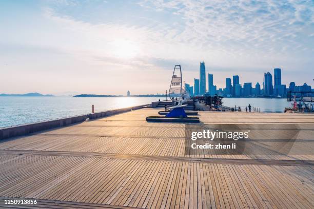 boardwalk by the sea - city port stock pictures, royalty-free photos & images