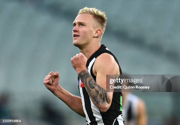 Jaidyn Stephenson of the Magpies celebrates kicking a goal during the round 3 AFL match between the Collingwood Magpies and the St Kilda Saints at...