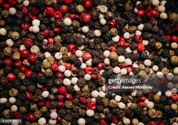 collection of peppercorn in black background - allspice stock pictures, royalty-free photos & images