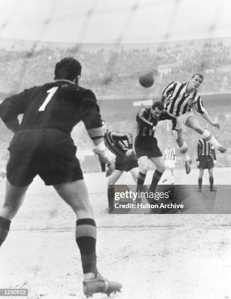 Inter Milan v Juventus. Cardarelli and Fongaro of Inter challenge John Charles of Juventus, but the Welshman still scores as the Turin side win the...