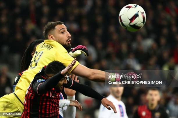 Paris Saint-Germain's Italian goalkeeper Gianluigi Donnarumma boxes the ball during the French L1 football match between Nice and Paris Saint-Germain...