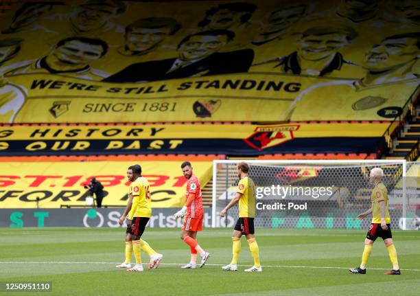 Troy Deeney, Abdoulaye Doucoure, Ben Foster, Craig Dawson and Will Hughes of Watford walk out prior to the Premier League match between Watford FC...