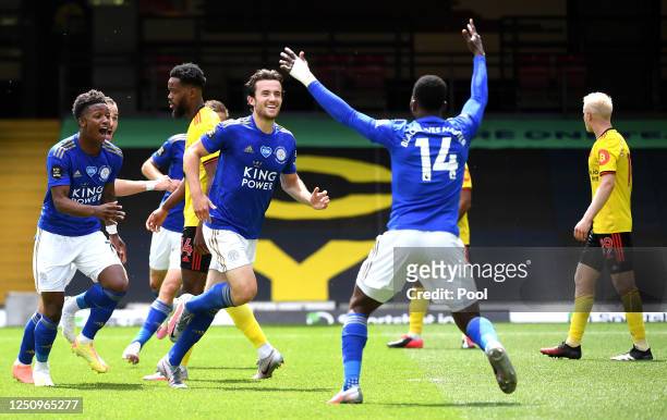 Ben Chilwell of Leicester City celebrates with Kelechi Iheanacho and Demarai Gray after scoring his team's first goal during the Premier League match...