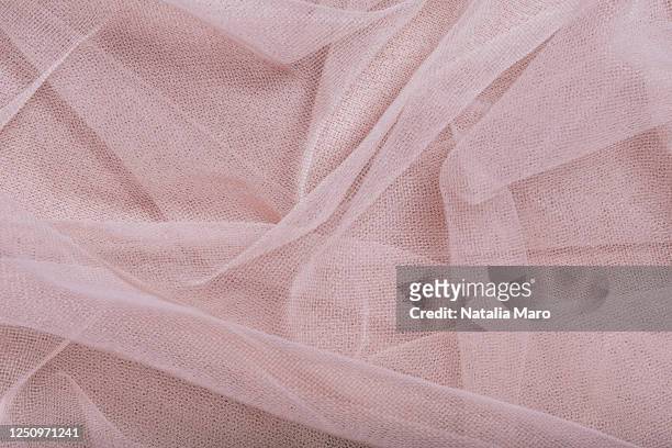beautiful layers of delicate pink tulle fabric background. - wedding background foto e immagini stock