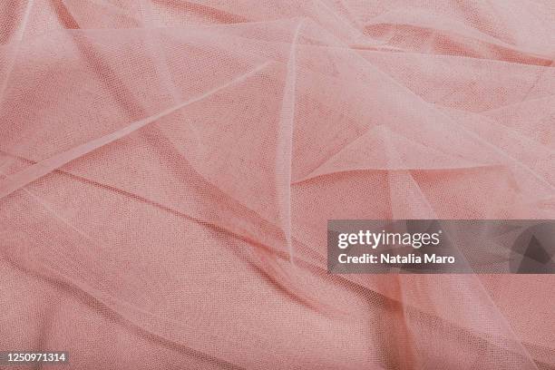 beautiful layers of delicate pink tulle fabric background. - wedding veil photos et images de collection