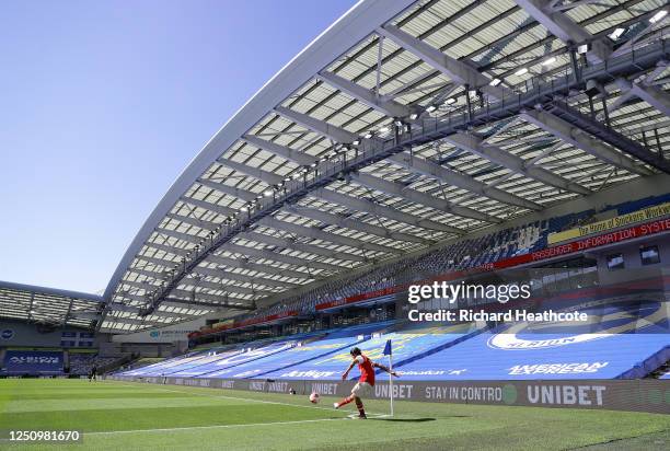 General view inside the stadium as Dani Ceballos of Arsenal takes a corner kick during the Premier League match between Brighton & Hove Albion and...