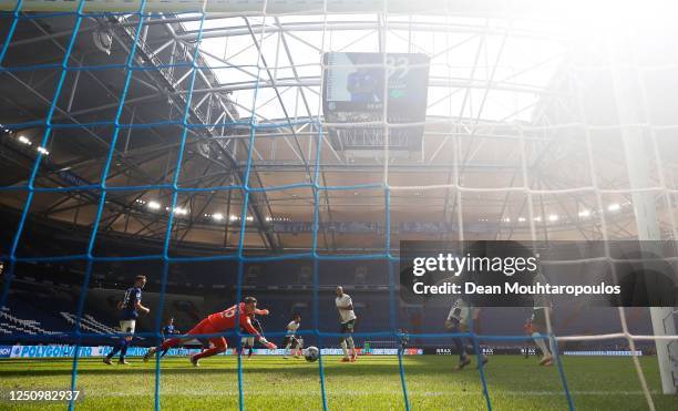 Joao Victor of VfL Wolfsburg scores a goal past Alexander Nuebel FC Schalke 04during the Bundesliga match between FC Schalke 04 and VfL Wolfsburg at...