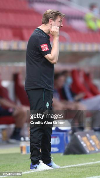 Florian Kohfeldt, head coach of Bremen looks dejected during the Bundesliga match between 1. FSV Mainz 05 and SV Werder Bremen at Opel Arena on June...