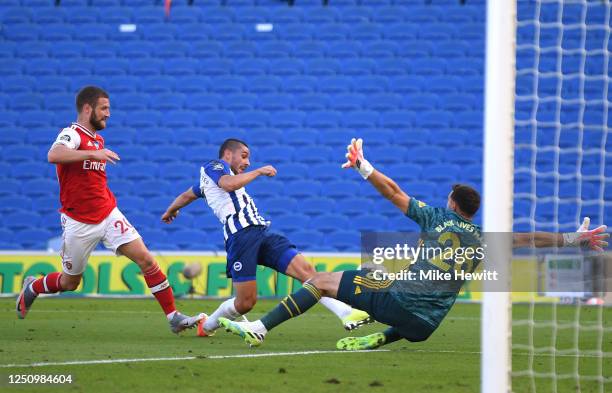 Neal Maupay of Brighton and Hove Albion scores his team's second goal past Emiliano Martinez of Arsenal during the Premier League match between...