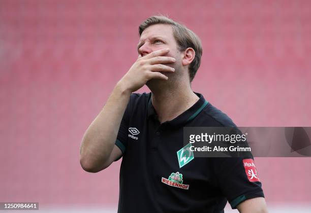 Florian Kohfeldt, head coach of Bremen looks dejected after the Bundesliga match between 1. FSV Mainz 05 and SV Werder Bremen at Opel Arena on June...
