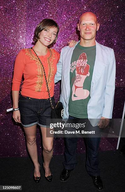 Camilla Rutherford and Dominic Burns attend the Rimmel & Kate Moss Party to celebrate their 10 year partnership at Battersea Power station on...