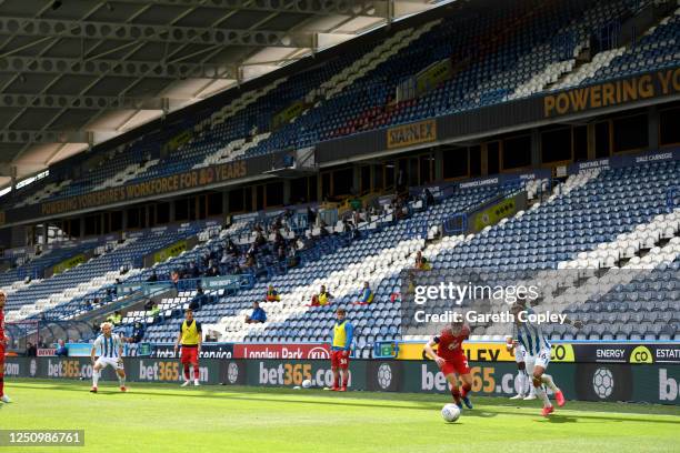 Karlan Ahearne-Grant of Huddersfield runs down the wing during the Sky Bet Championship match between Huddersfield Town and Wigan Athletic at John...