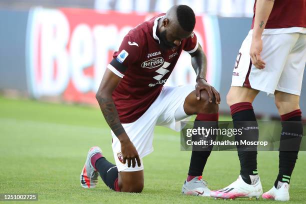 Torino FC's Cameroonian defender Nicolas Nkoulou takes the knee after scoring to give his side a 1-0 lead during the Serie A match between Torino FC...