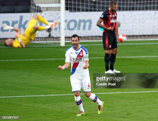 Luka Milivojevic of Crystal Palace celebrates after scoring his team's first goal during the Premier League match between AFC Bournemouth and Crystal...