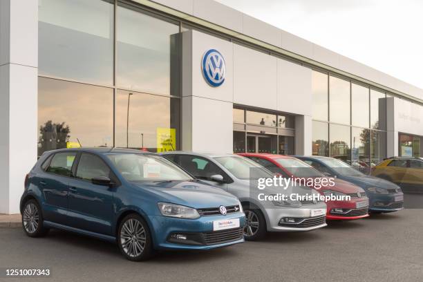 volkswagen dealership with polo cars - volkswagen polo stock pictures, royalty-free photos & images