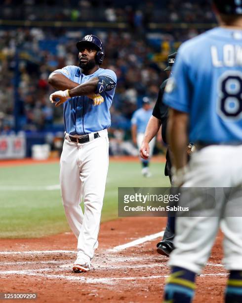 Randy Arozarena of the Tampa Bay Rays celebrates after hitting a home run during the eighth inning against the Oakland Athletics at Tropicana Field...