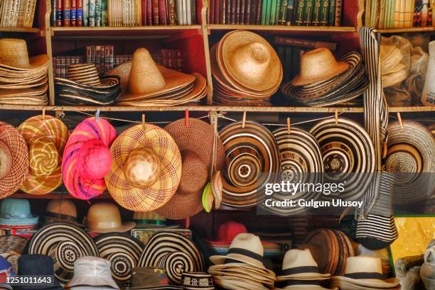 colombian hats for sale at market - colombian culture stock pictures, royalty-free photos & images