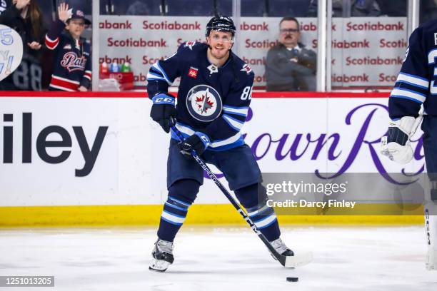 Nate Schmidt of the Winnipeg Jets takes part in the pre-game warm up prior to NHL action against the Nashville Predators at the Canada Life Centre on...