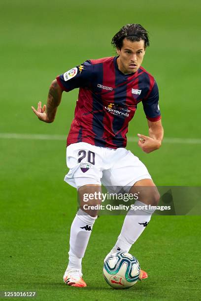 Roberto Olabe of Extremadura UD with the ball during the La Liga Smartbank match between Malaga CF and Extremadura UD at Estadio La Rosaleda on June...