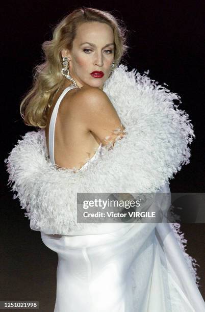 Jerry Hall walks the runway at the last Yves Saint Laurent Haute Couture Spring/Summer 2002 retrospective show, for his last Haute Couture Collection...