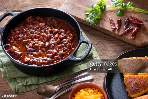 chili with meat - cornbread stock pictures, royalty-free photos & images