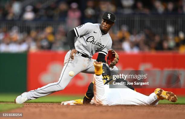 Andrew McCutchen of the Pittsburgh Pirates safely steals second base in front of Tim Anderson of the Chicago White Sox in the third inning of the...