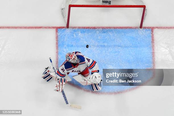 Goaltender Igor Shesterkin of the New York Rangers follows a loose puck during the second period of a game against the Columbus Blue Jackets at...