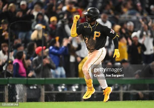 Andrew McCutchen of the Pittsburgh Pirates celebrates his solo home run in the ninth inning of the game against the Chicago White Sox at PNC Park on...