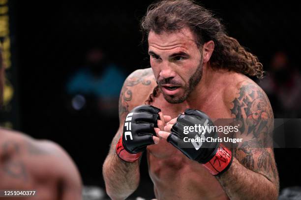 Clay Guida battles Bobby Green in their lightweight bout during the UFC Fight Night event at UFC APEX on June 20, 2020 in Las Vegas, Nevada.