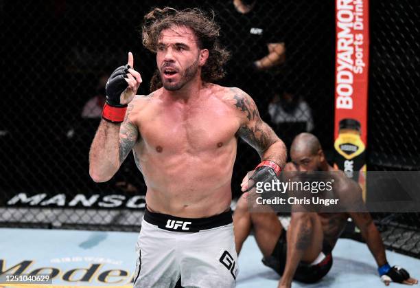 Clay Guida returns to his corner after the first round of his lightweight bout against Bobby Green during the UFC Fight Night event at UFC APEX on...