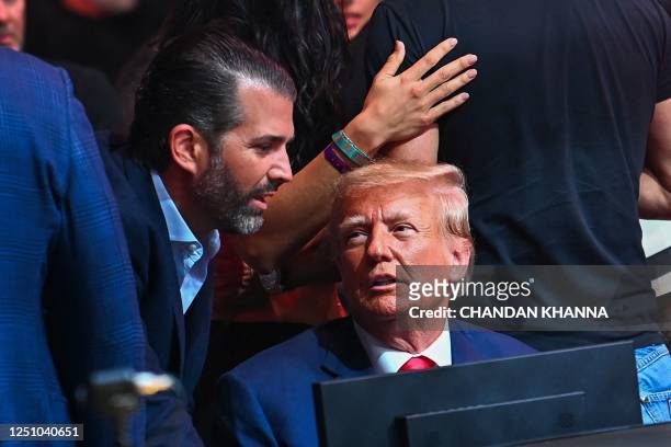 Former President Donald Trump and his son Donald Trump Jr. Attend the Ultimate Fighting Championship 287 mixed martial arts event at the Kaseya...