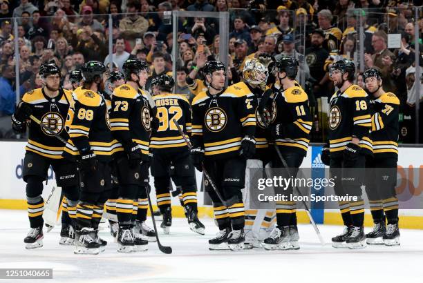 The Bruins wait to celebrate as tensions flare after a game between the Boston Bruins and the New Jersey Devils on April 8 at TD Garden in Boston,...