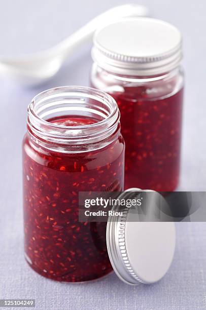 raspberry jam - framboises stock-fotos und bilder