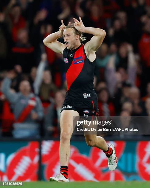 Mason Redman of the Bombers celebrates a goal during the 2023 AFL Round 04 match between the Essendon Bombers and the GWS Giants at Marvel Stadium on...